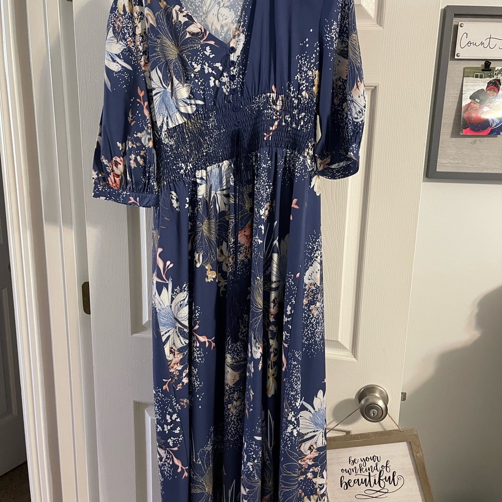 NWOT beautiful soft maxi dress. Blue with floral pattern. elastic waistband L
